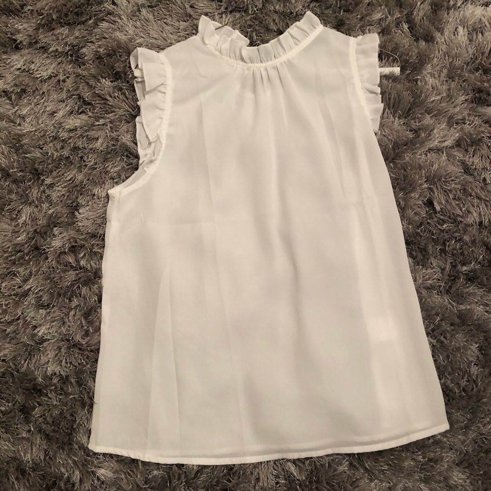 Brand new, never worn!! High neck ruffle blouse